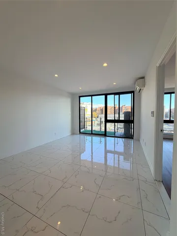 a view of an empty room with window