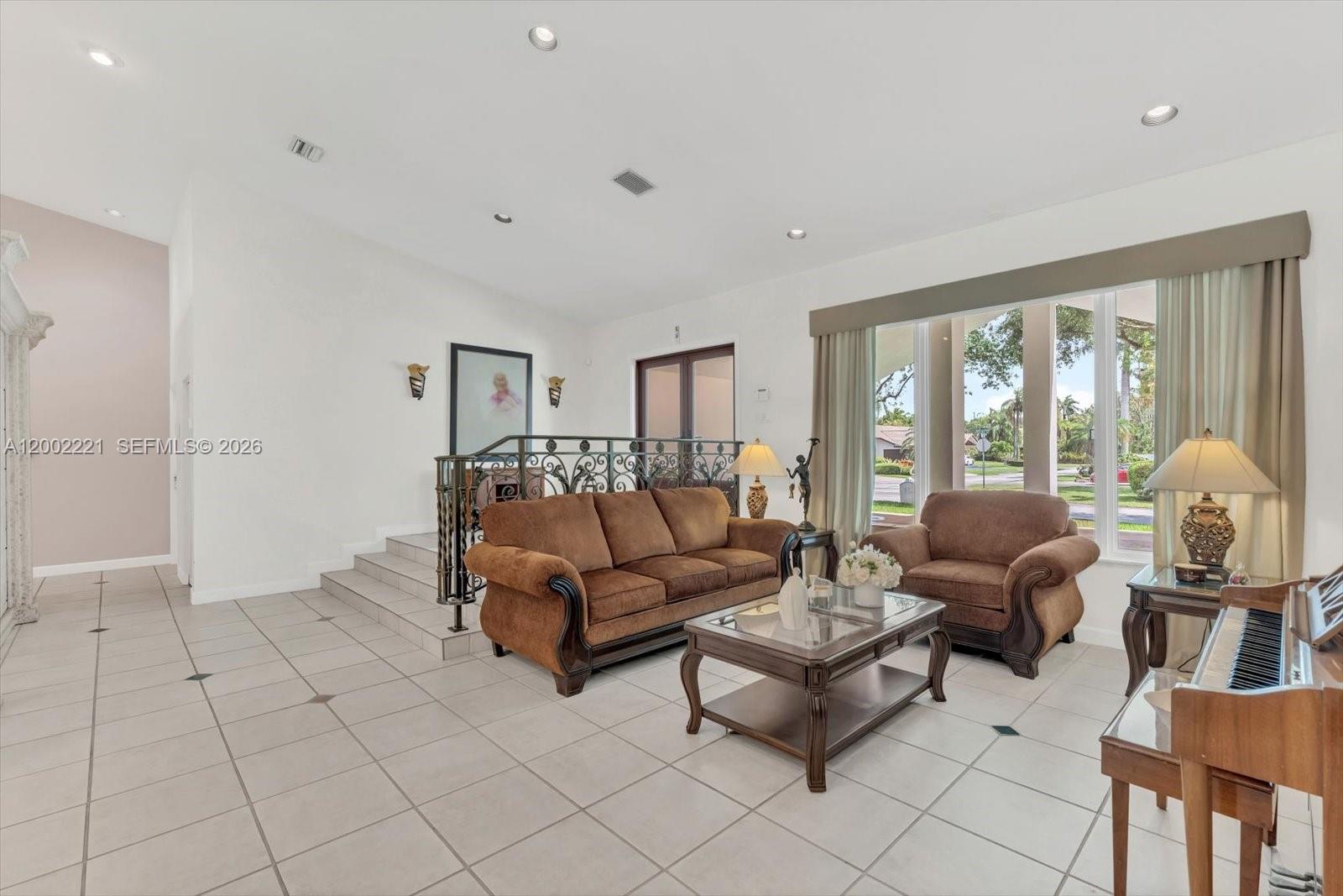 9941 Southwest 143rd Street Miami, FL 33176 - Photo 7 of 48 Volume ceilings and lots of natural light