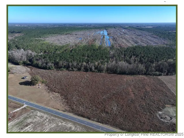 a view of a yard next to a yard