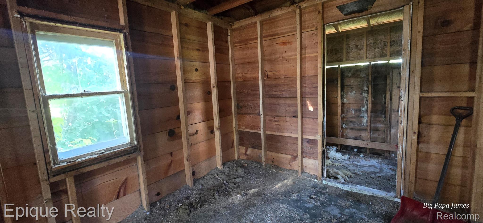 5831 Reed Street Deford, MI 48729 - Photo 6 of 11 Bathroom featuring wooden walls