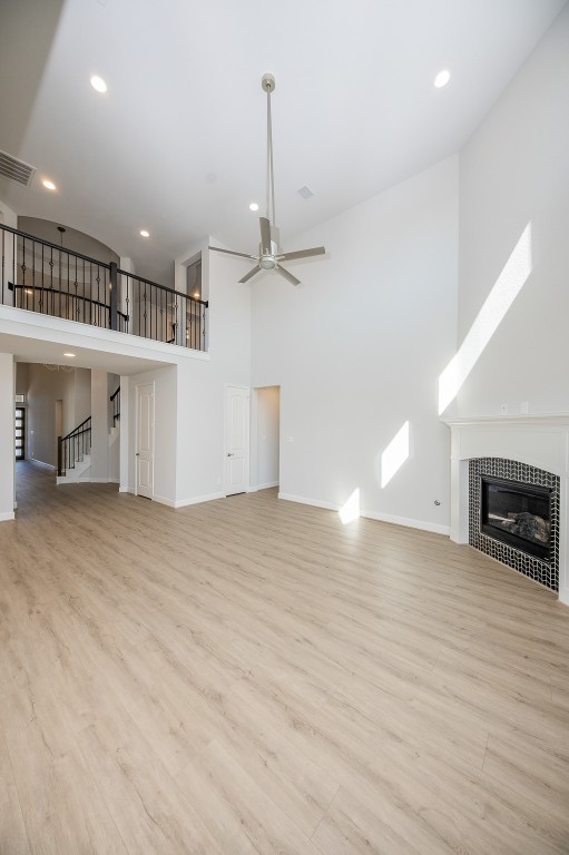 29819 Breezy Pnes Loop Fulshear, TX 77441 - Photo 20 of 50 a view of a livingroom with a fireplace