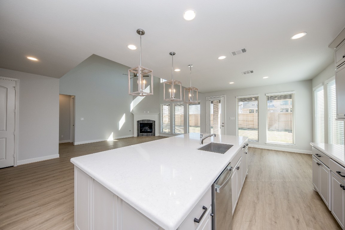 29819 Breezy Pnes Loop Fulshear, TX 77441 - Photo 29 of 50 a large white kitchen with a large window
