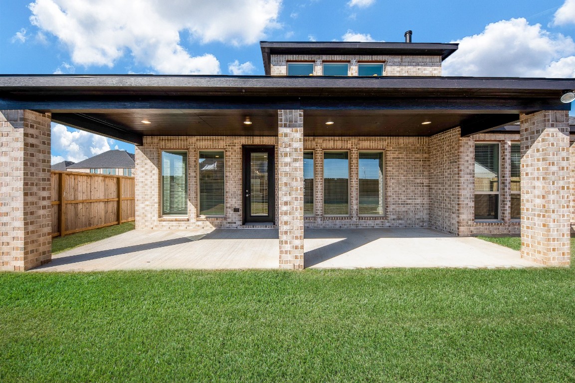 29819 Breezy Pnes Loop Fulshear, TX 77441 - Photo 4 of 50 a view of house with backyard