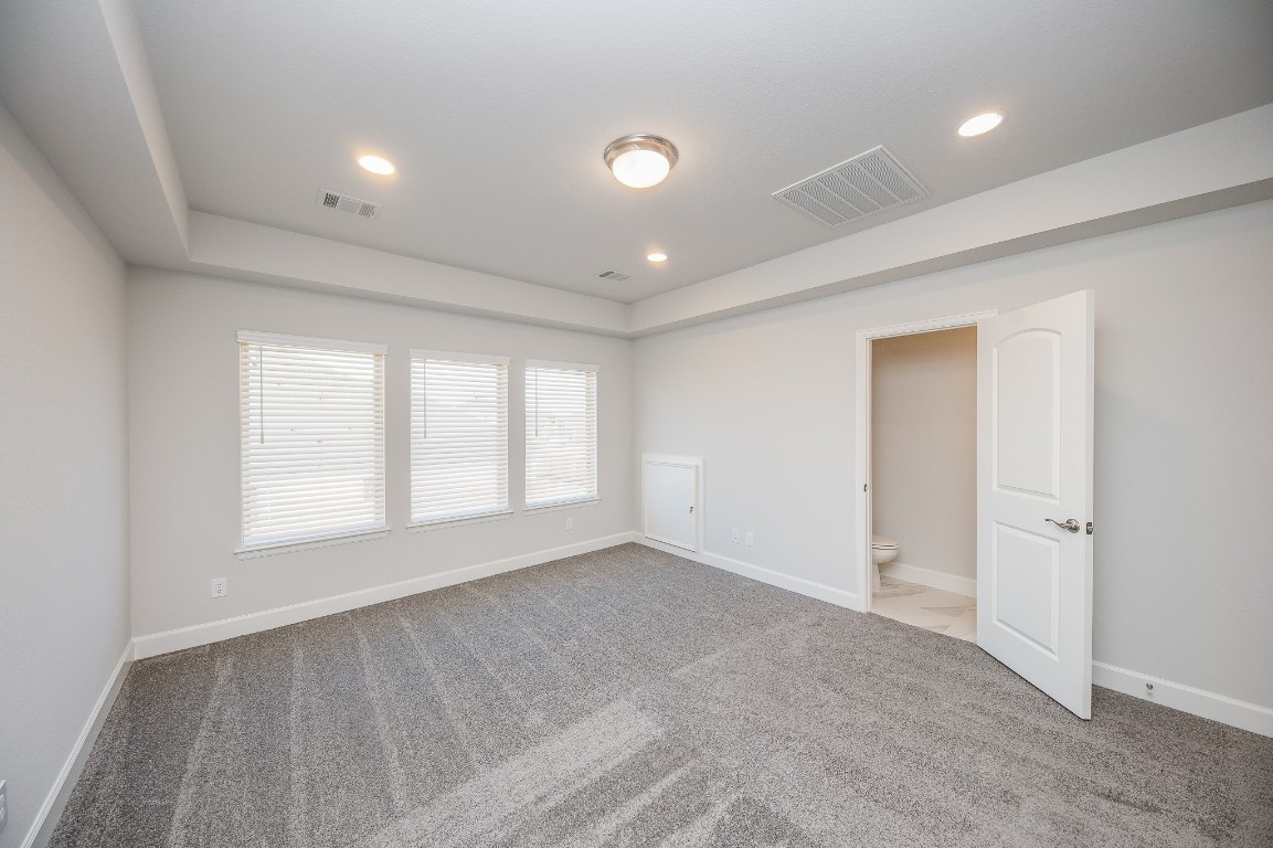 29819 Breezy Pnes Loop Fulshear, TX 77441 - Photo 48 of 50 a view of an empty room with a window