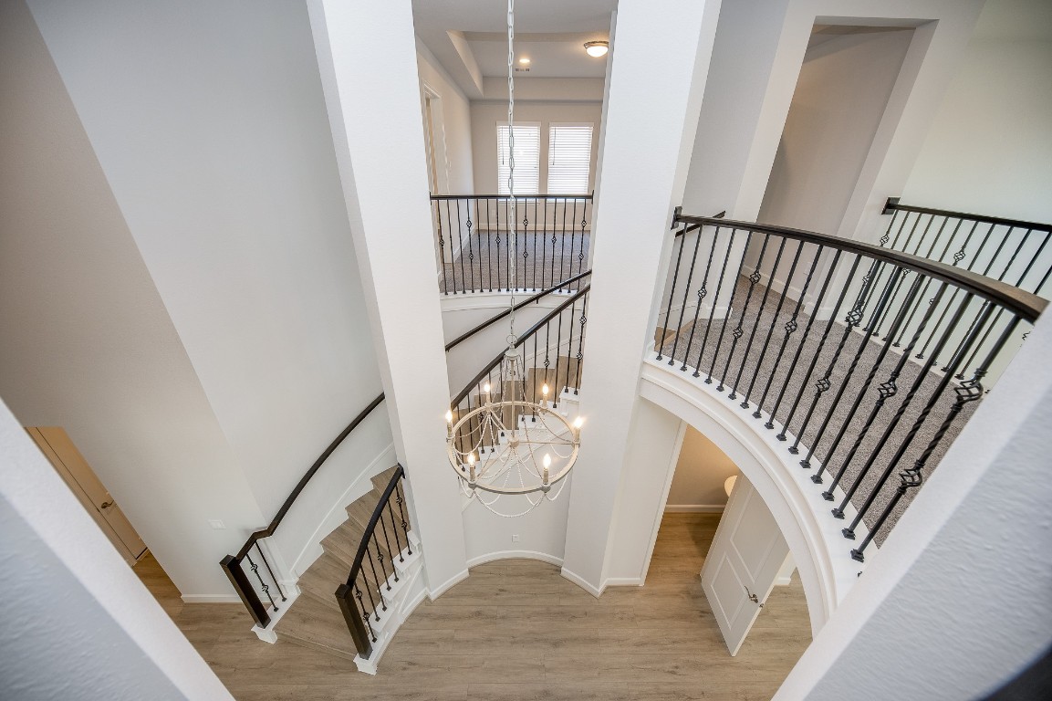29819 Breezy Pnes Loop Fulshear, TX 77441 - Photo 6 of 50 a view of an entryway with wooden floor