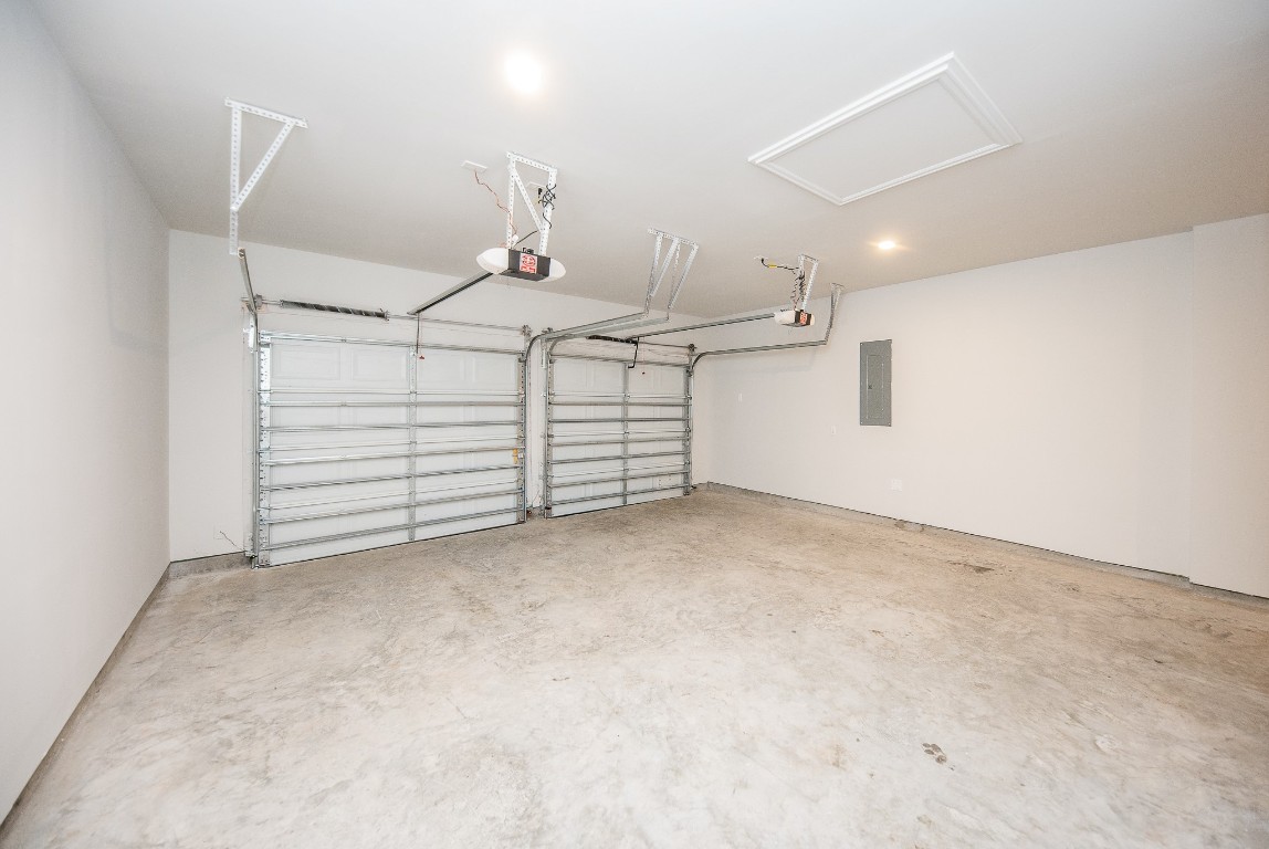 29819 Breezy Pnes Loop Fulshear, TX 77441 - Photo 9 of 50 a view of a garage