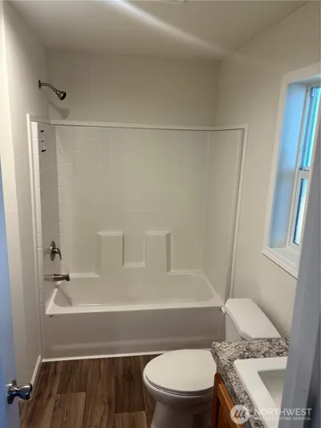a bathroom with a sink and a toilet
