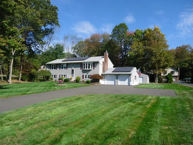 a view of house with outdoor space and street view