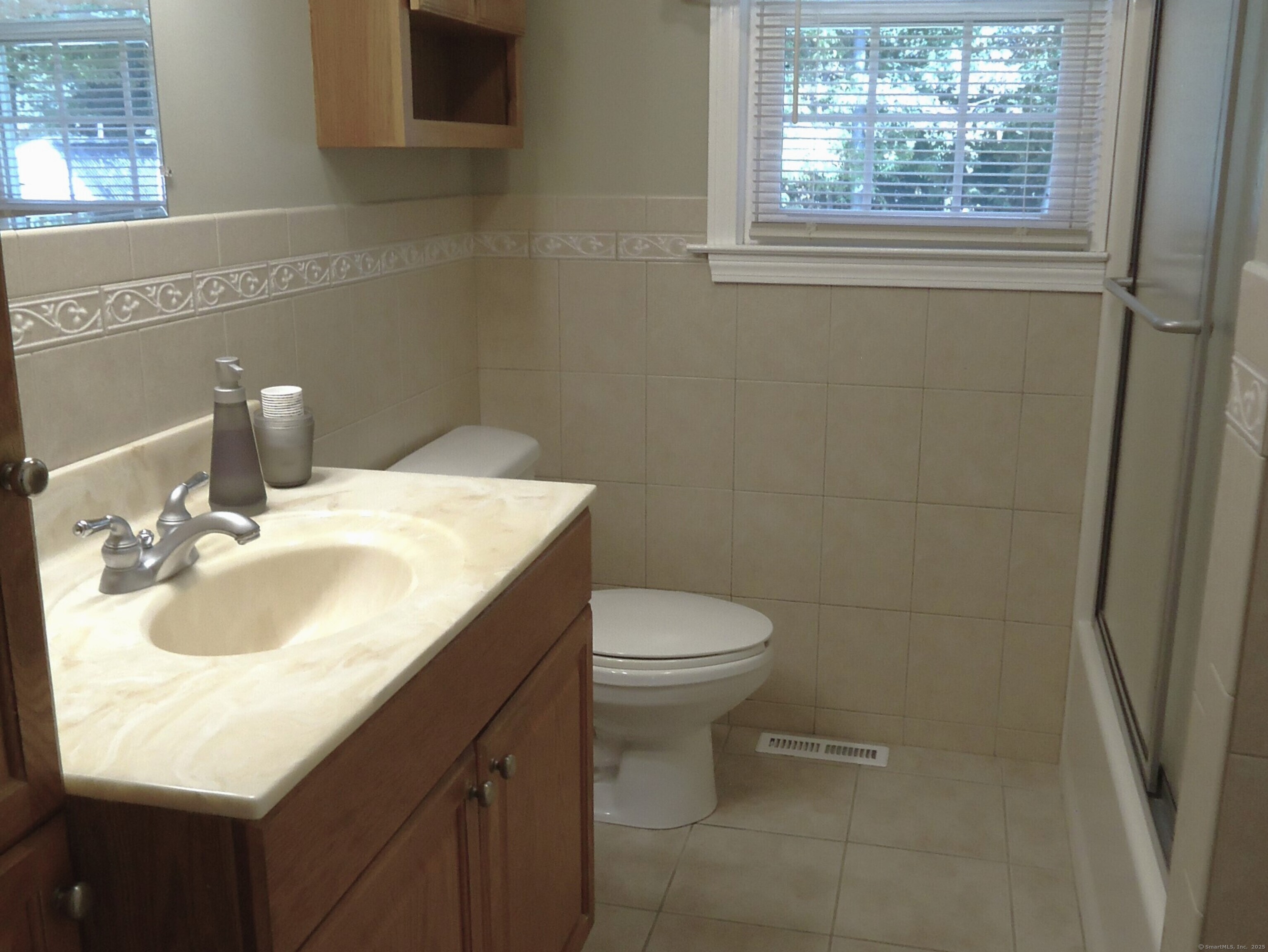 20 Fawn Ridge Drive North Haven, CT 06473 - Photo 15 of 27 a bathroom with a sink toilet and vanity