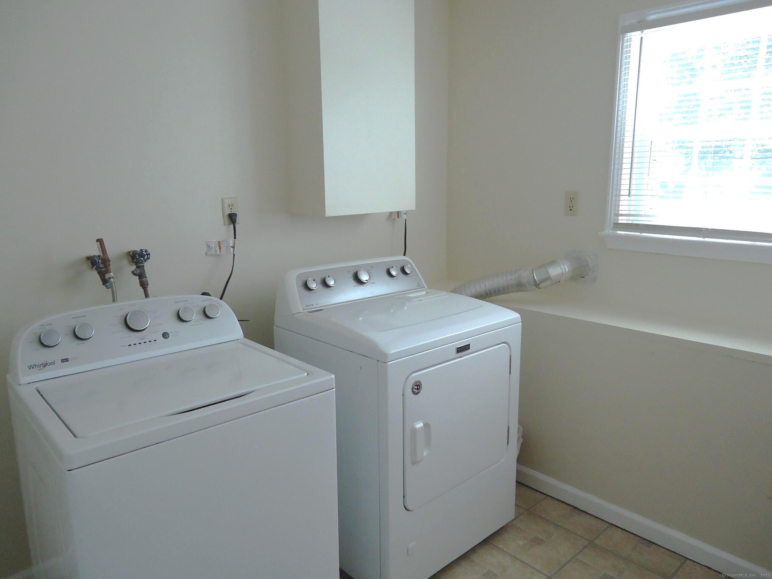 20 Fawn Ridge Drive North Haven, CT 06473 - Photo 19 of 27 a utility room with dryer and washer