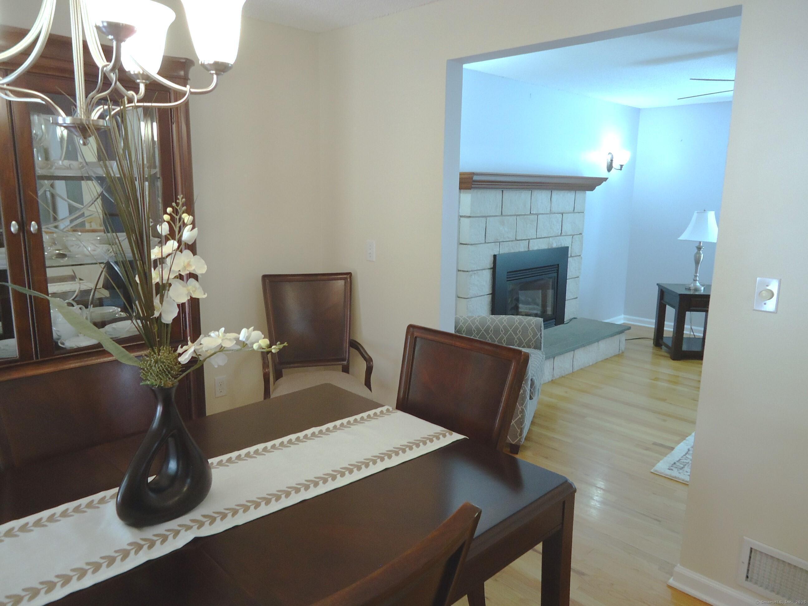 20 Fawn Ridge Drive North Haven, CT 06473 - Photo 10 of 27 a living room with furniture and a fireplace
