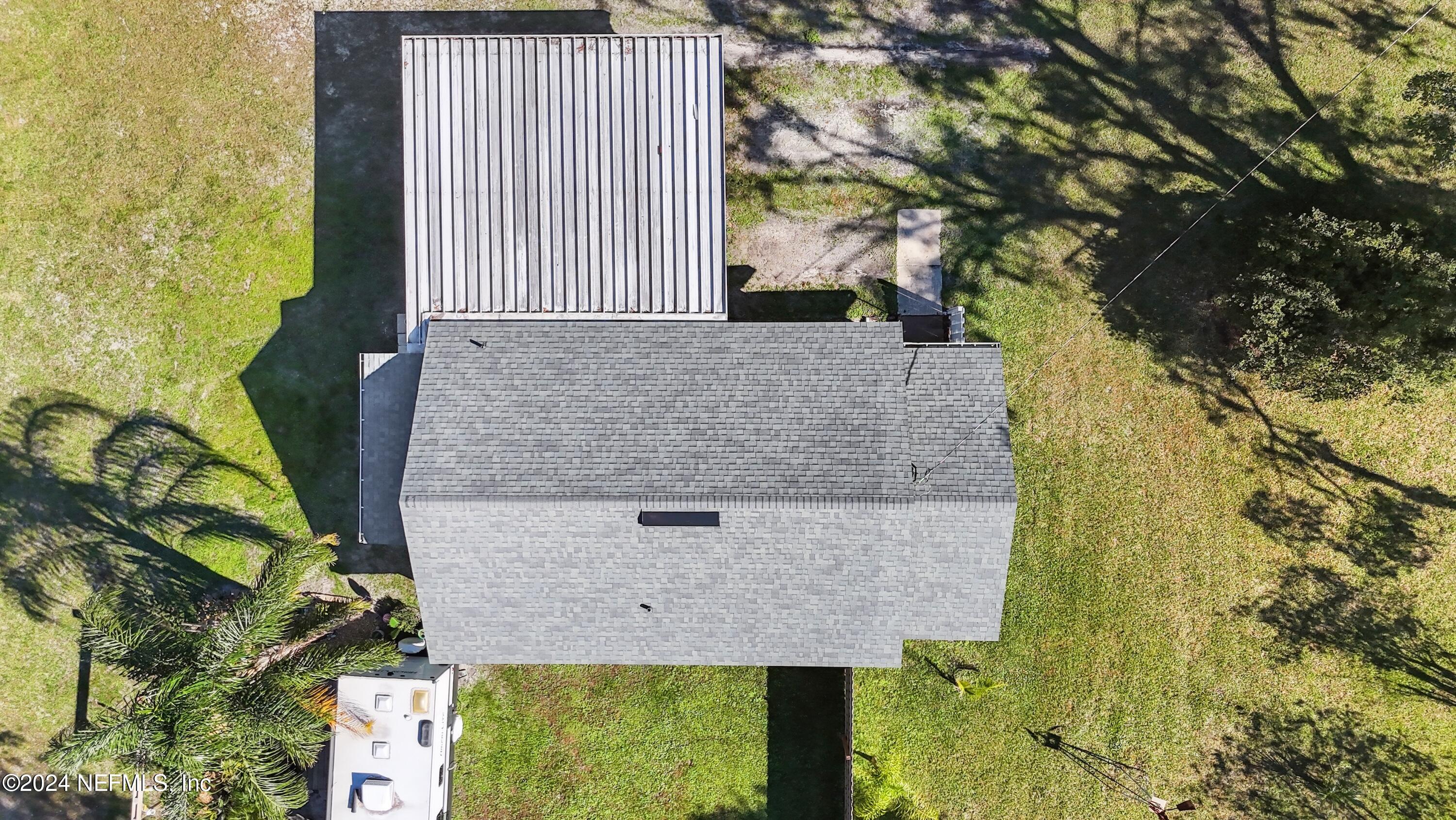 3629 Capper Road Jacksonville, FL 32218 - Photo 25 of 26 a front view of a house with a yard