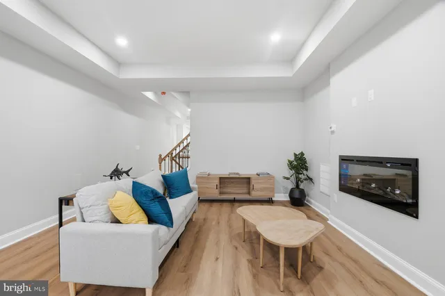 a living room with furniture and a couch