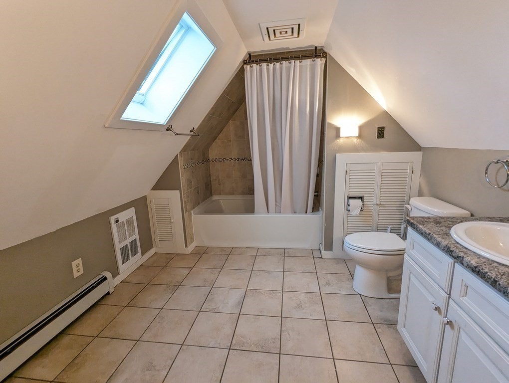 622 Turnpike Road New Ipswich, NH 03071 - Photo 24 of 30 a bathroom with a toilet a sink and mirror