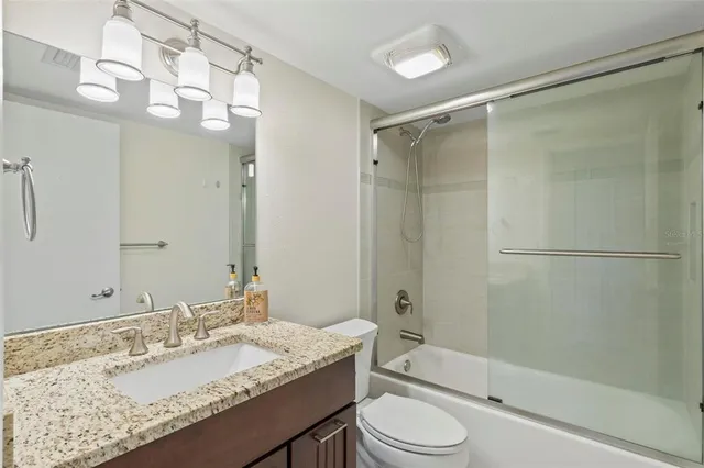 a view of a city with tall buildings