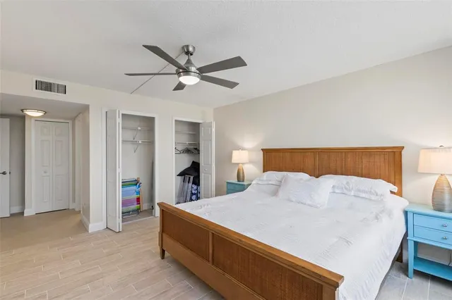 a front view of a building with outdoor seating