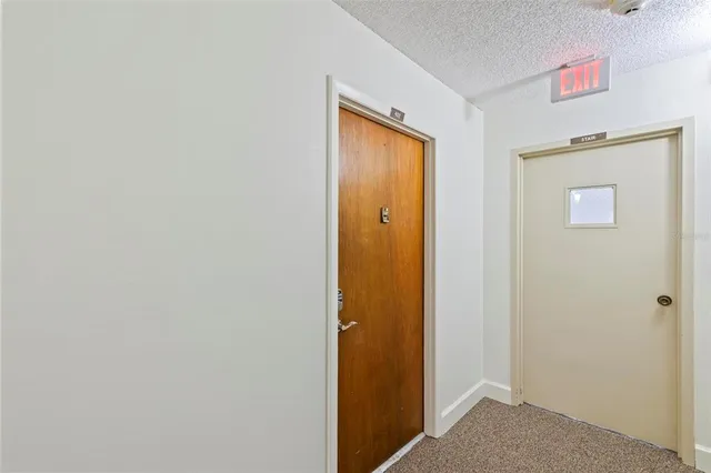 a outdoor living space with furniture and large windows
