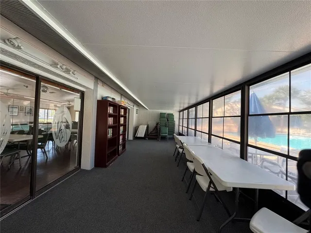 a view of a livingroom with furniture and window