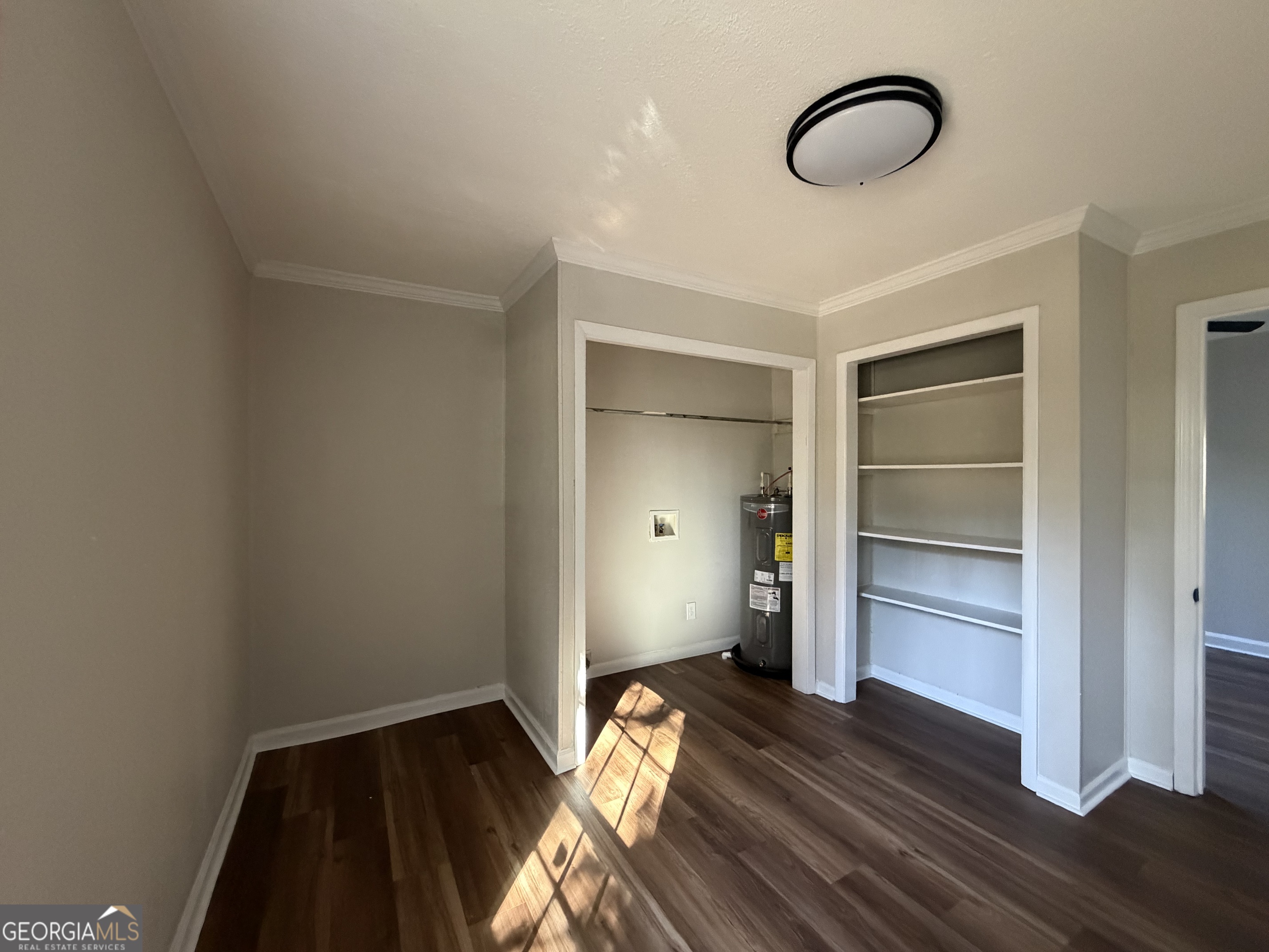 1502 Stonewall Street Dublin, GA 31021 - Photo 18 of 24 a view of room with wooden floor