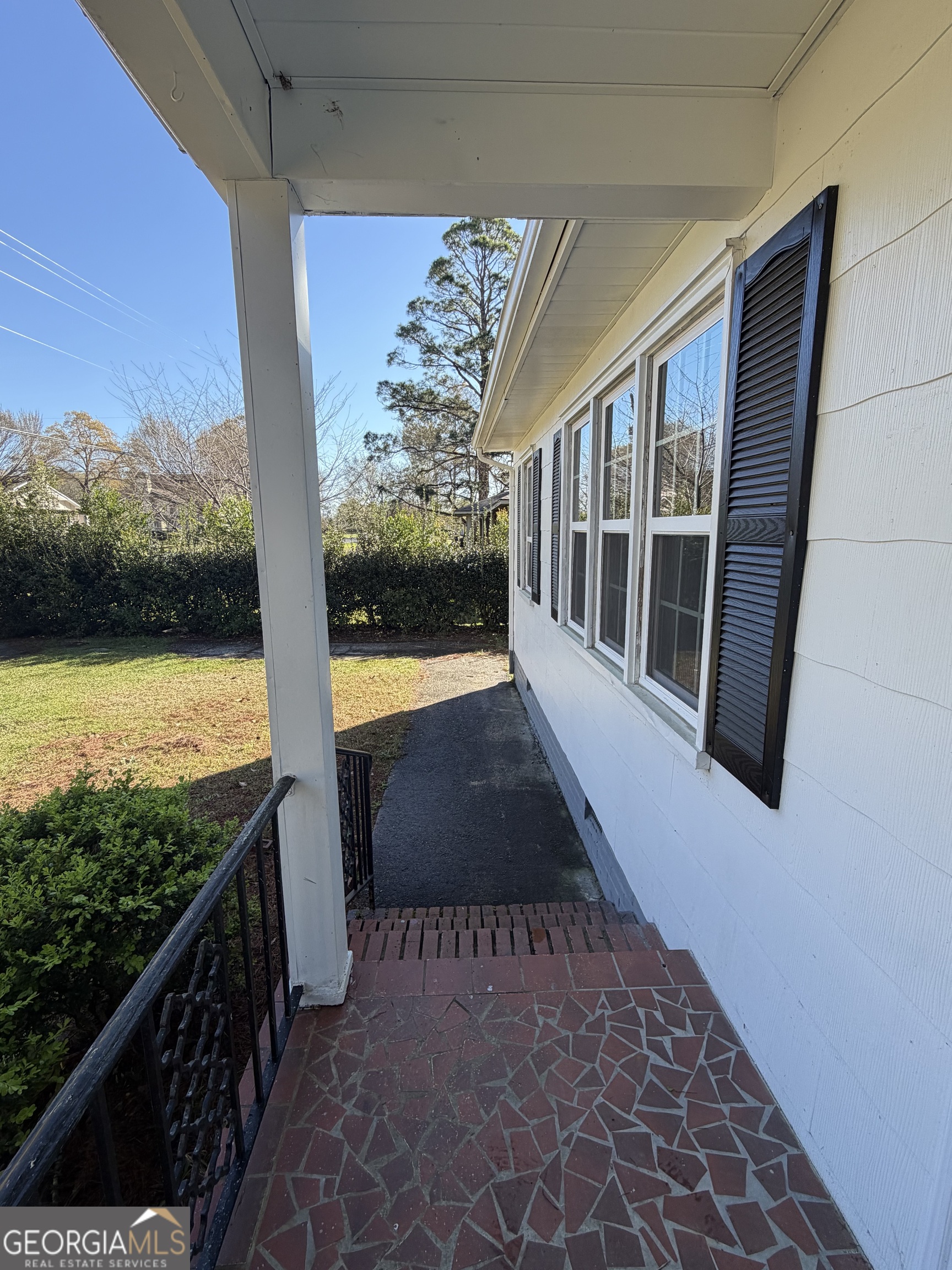 1502 Stonewall Street Dublin, GA 31021 - Photo 3 of 24 a view of a balcony with furniture