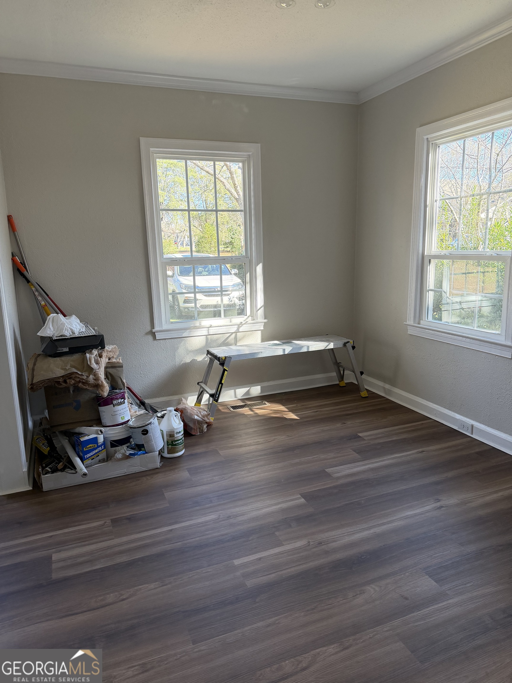1502 Stonewall Street Dublin, GA 31021 - Photo 8 of 24 a room with a wooden floor and a window