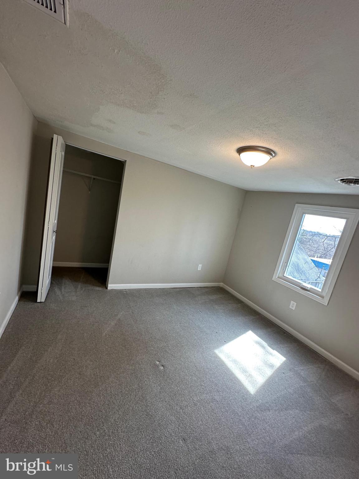 4427 Annapolis Road Halethorpe, MD 21227 - Photo 25 of 36 a view of an empty room with a window