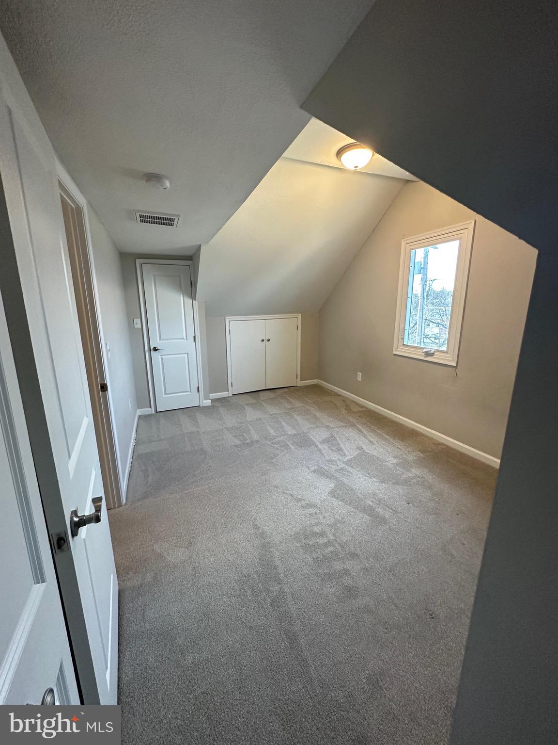 4427 Annapolis Road Halethorpe, MD 21227 - Photo 32 of 36 an empty room with windows