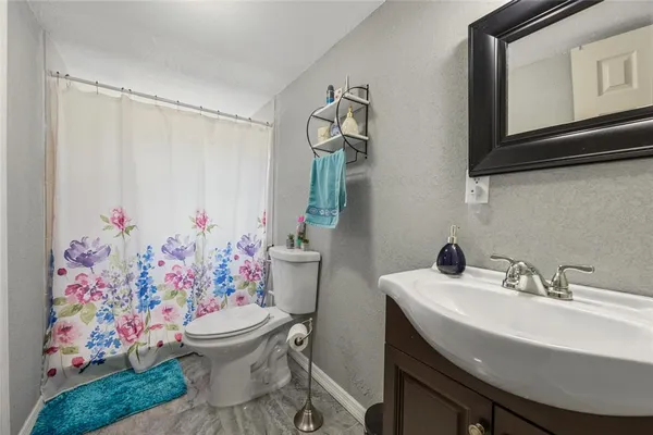 a bedroom with a bed and closet