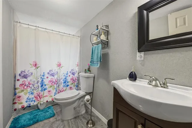 a bedroom with a bed and closet