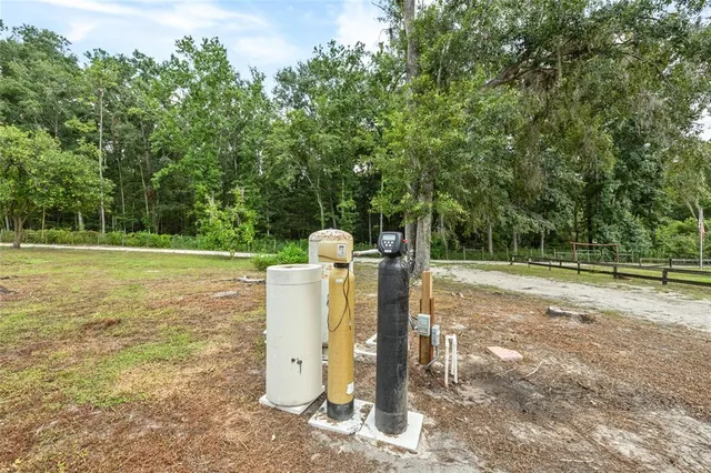 a bedroom with a bed and a table in it