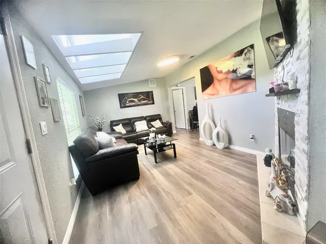 a bedroom with a bed and a table in it