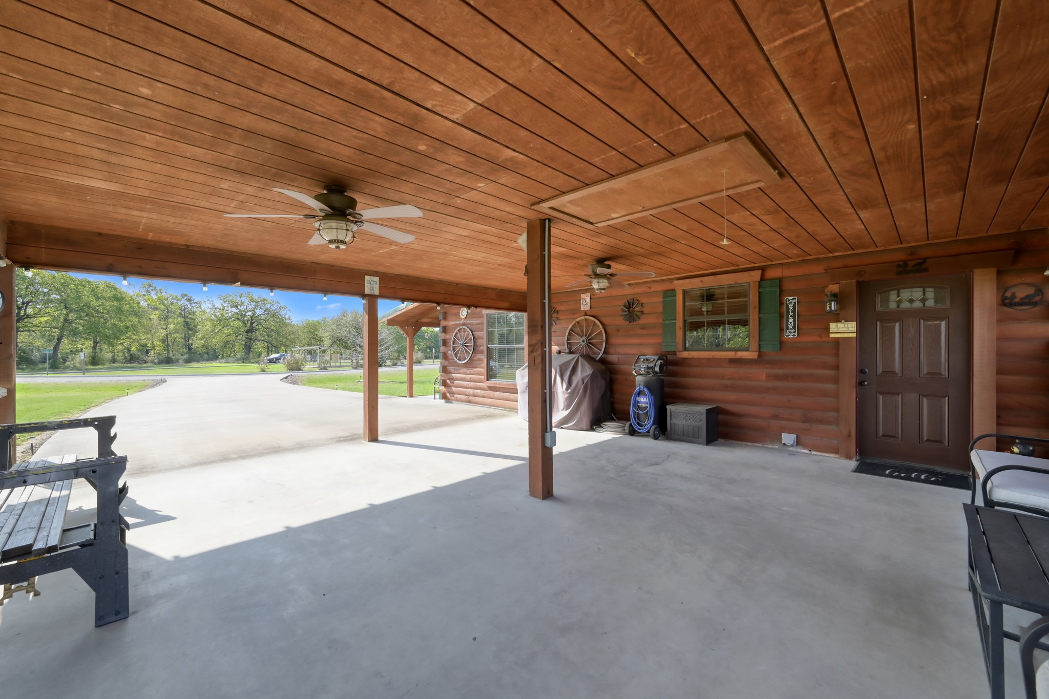 130 Raleigh Circle Trinity, TX 75862 - Photo 13 of 19 a view of a porch with furniture and a yard