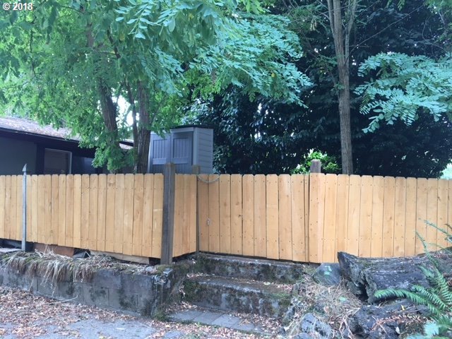 4840 Northeast 99th Avenue Portland, OR 97220 - Photo 3 of 6 a view of small yard with wooden fence