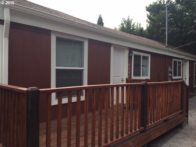 4840 Northeast 99th Avenue Portland, OR 97220 - Photo 5 of 6 a view of a balcony with furniture