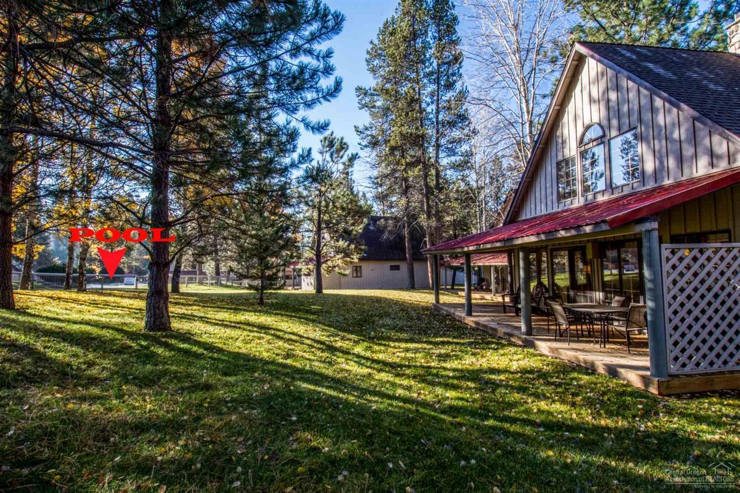 57522 Circle 4 Cabin Road Sunriver, OR 97707 - Photo 25 of 25 a view of a house with a yard
