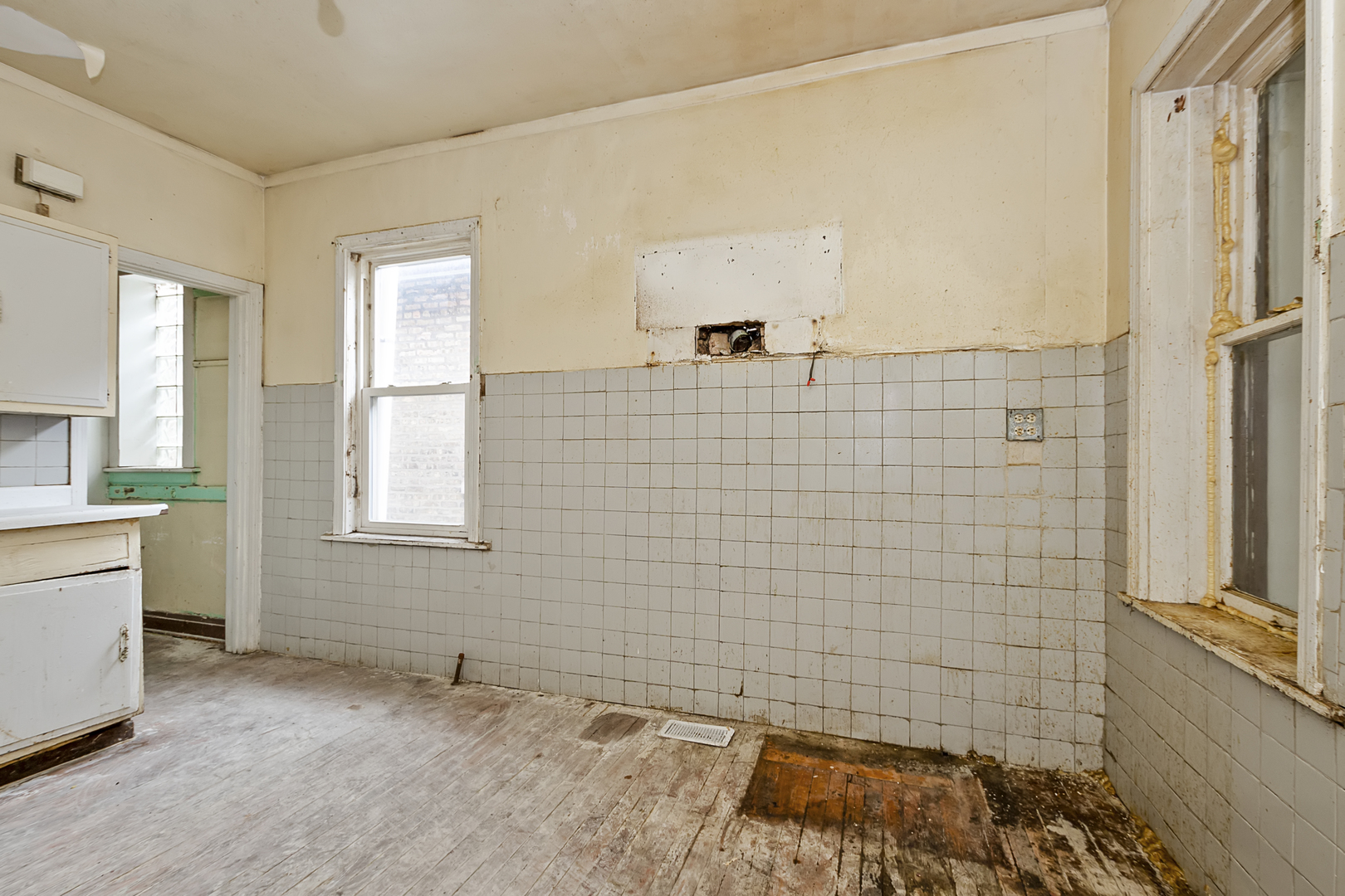 4821 West Hirsch Street Chicago, IL 60651 - Photo 16 of 23 a bathroom with a bathtub and shower
