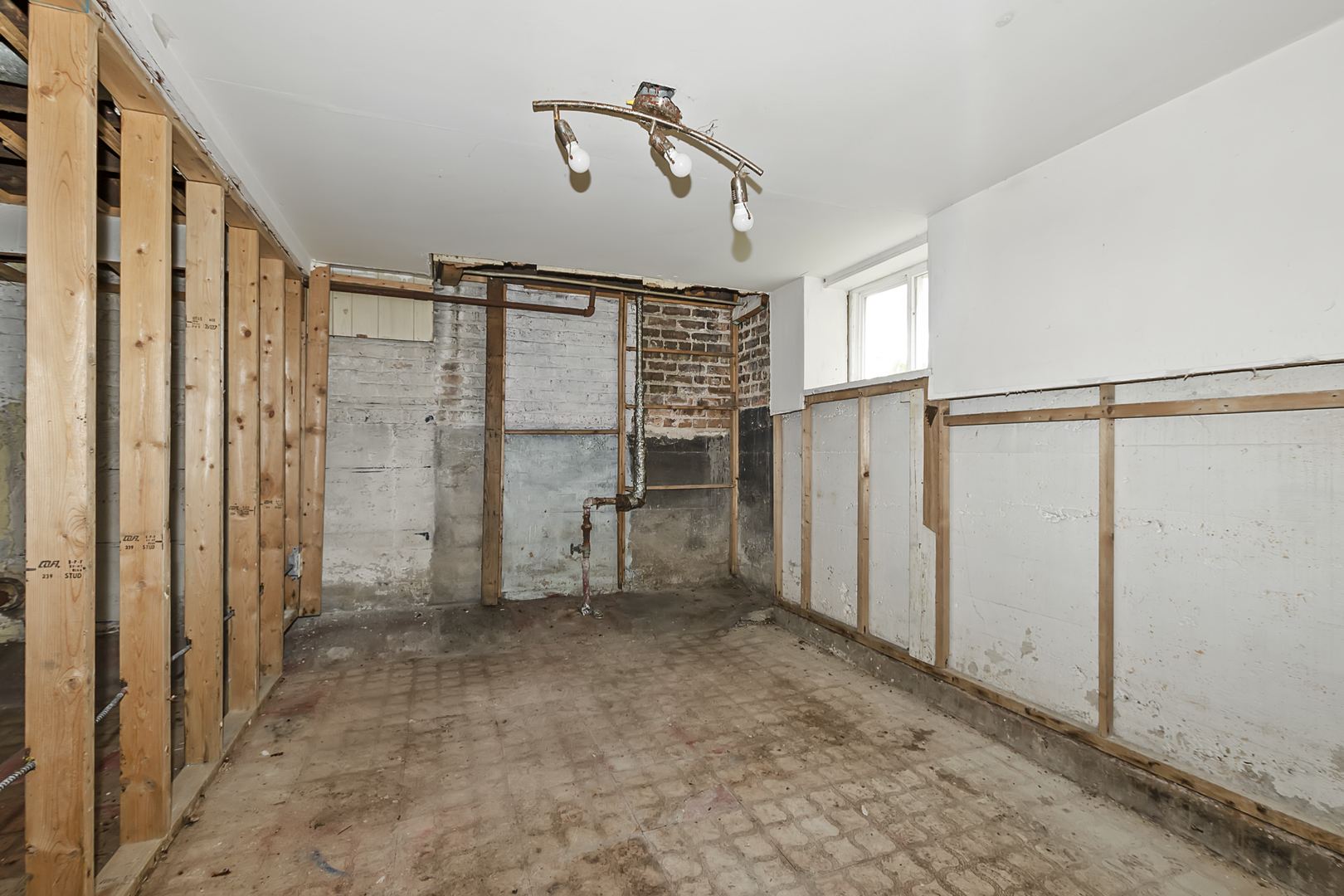 4821 West Hirsch Street Chicago, IL 60651 - Photo 19 of 23 a view of an empty room with a window