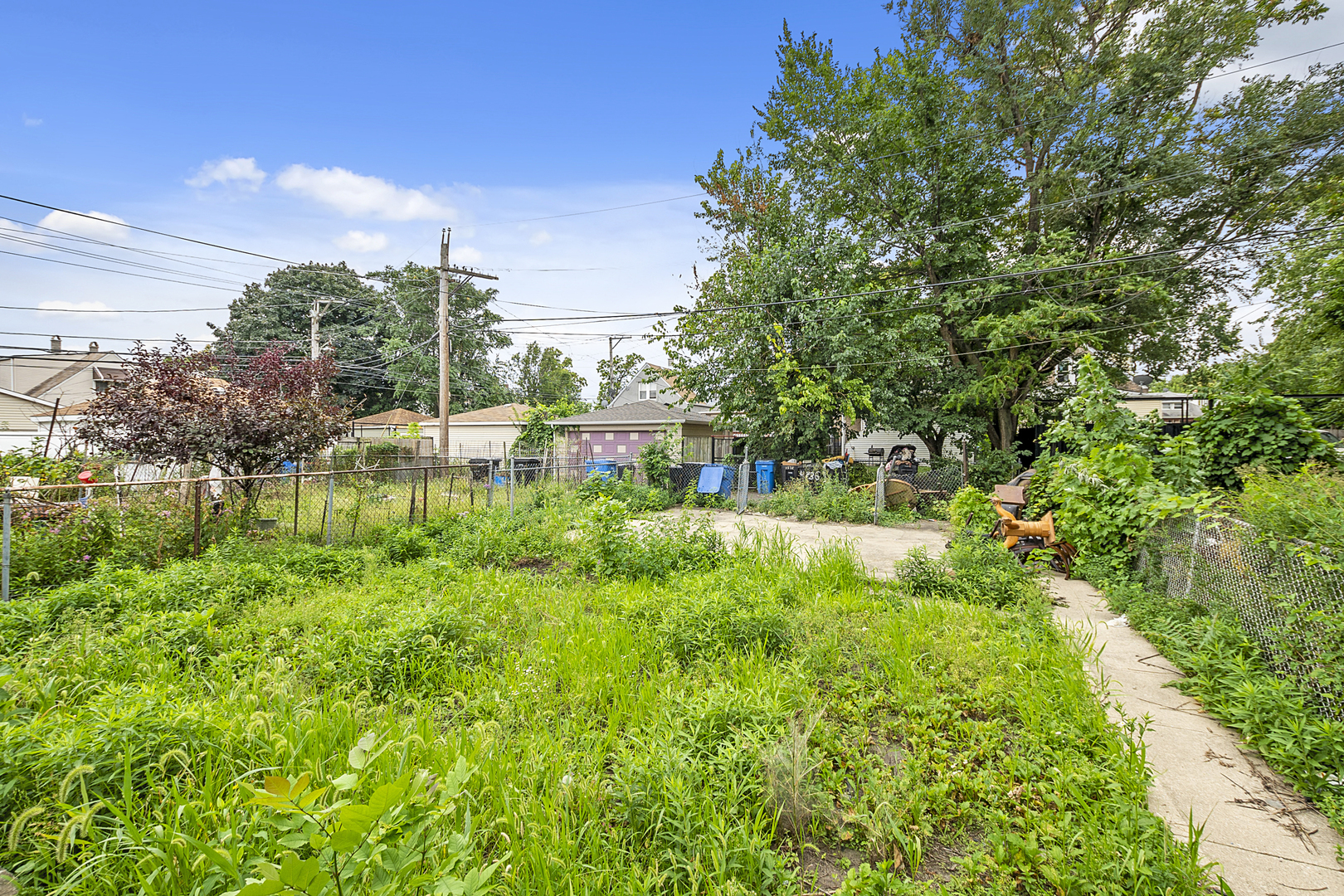 4821 West Hirsch Street Chicago, IL 60651 - Photo 23 of 23 a view of a garden with houses