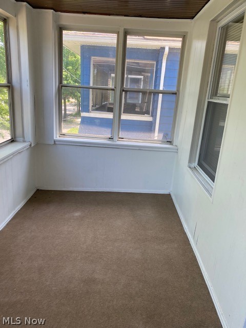 802 Wayside Road Cleveland, OH 44110 - Photo 25 of 33 View of carpeted spare room