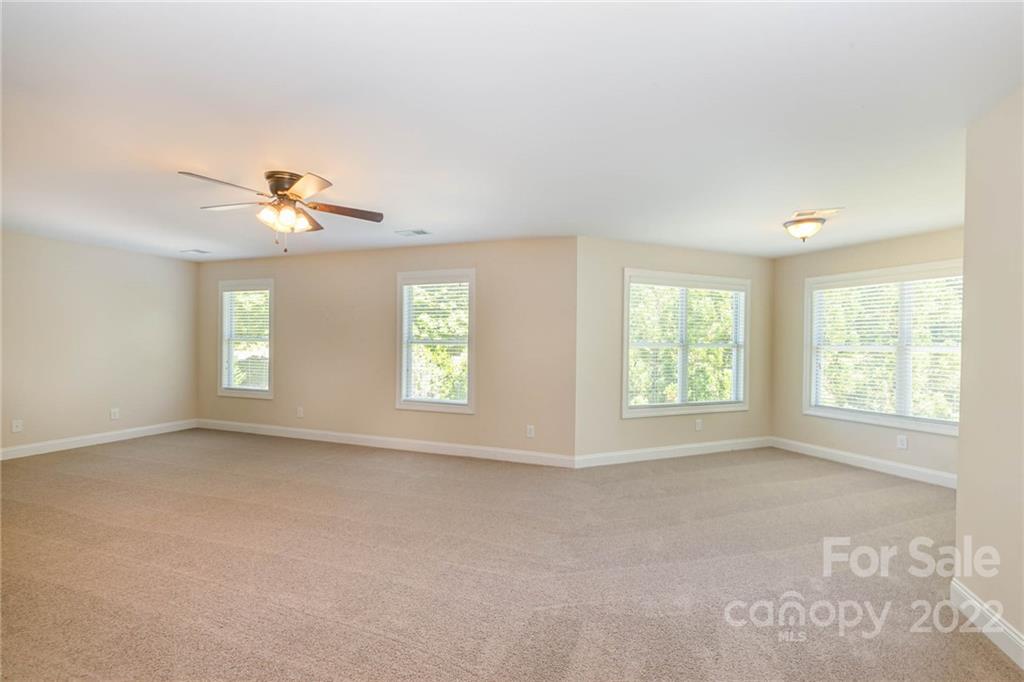 1000 Ridgehaven Road Waxhaw, NC 28173 - Photo 13 of 22 a view of an empty room with a window