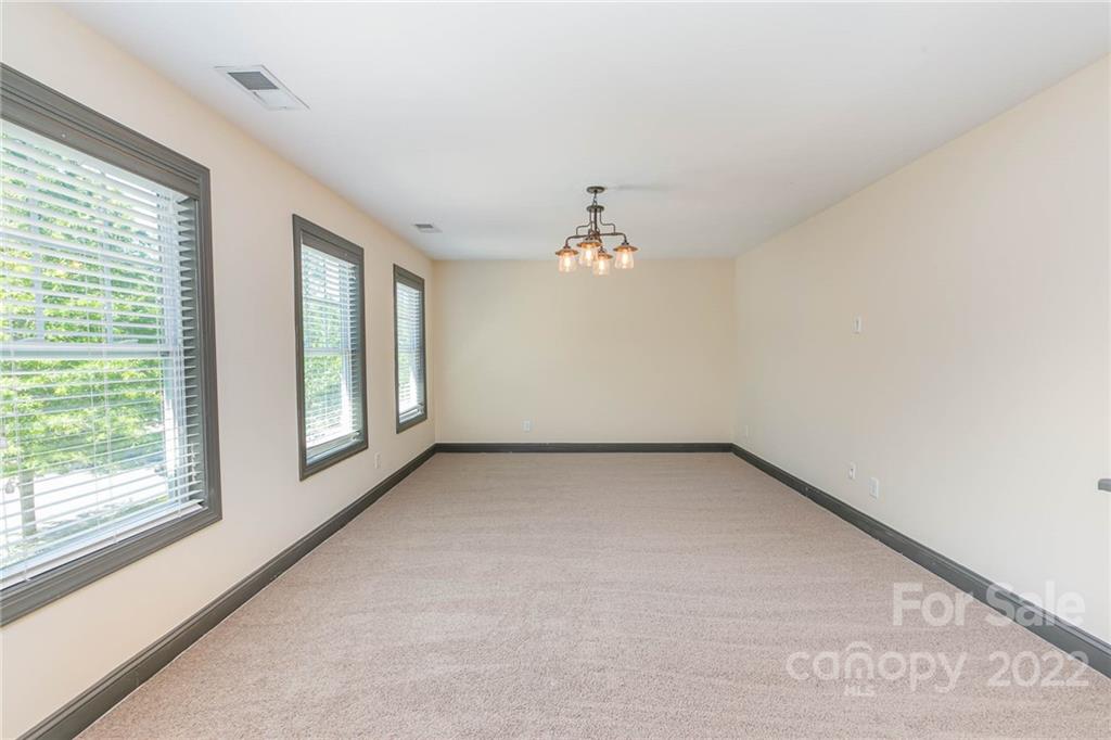 1000 Ridgehaven Road Waxhaw, NC 28173 - Photo 22 of 22 a view of an empty room with a window