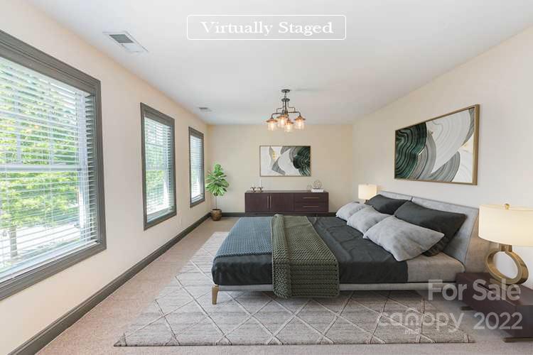 1000 Ridgehaven Road Waxhaw, NC 28173 - Photo 3 of 22 a bedroom with a bed and window