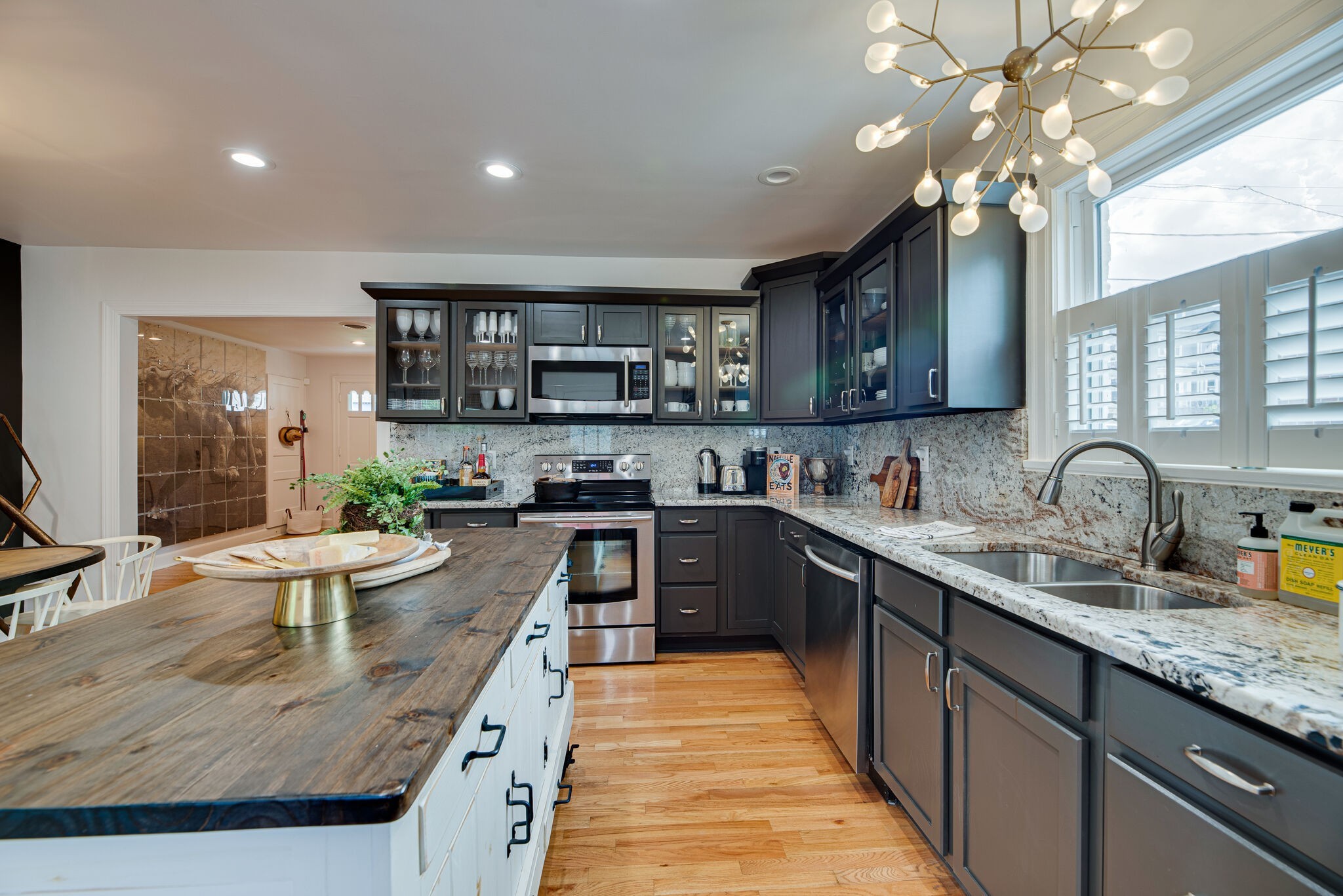 1715 Holly Street Nashville, TN 37206 - Photo 16 of 54 a kitchen with sink a stove and cabinets