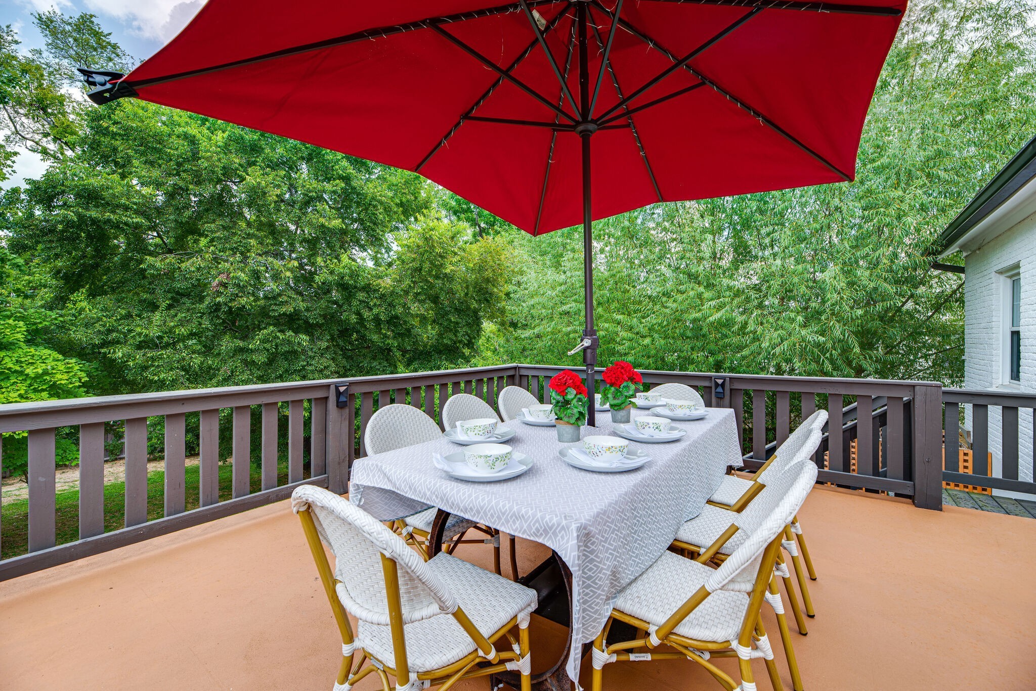 1715 Holly Street Nashville, TN 37206 - Photo 19 of 54 a balcony with wooden floor table and chairs
