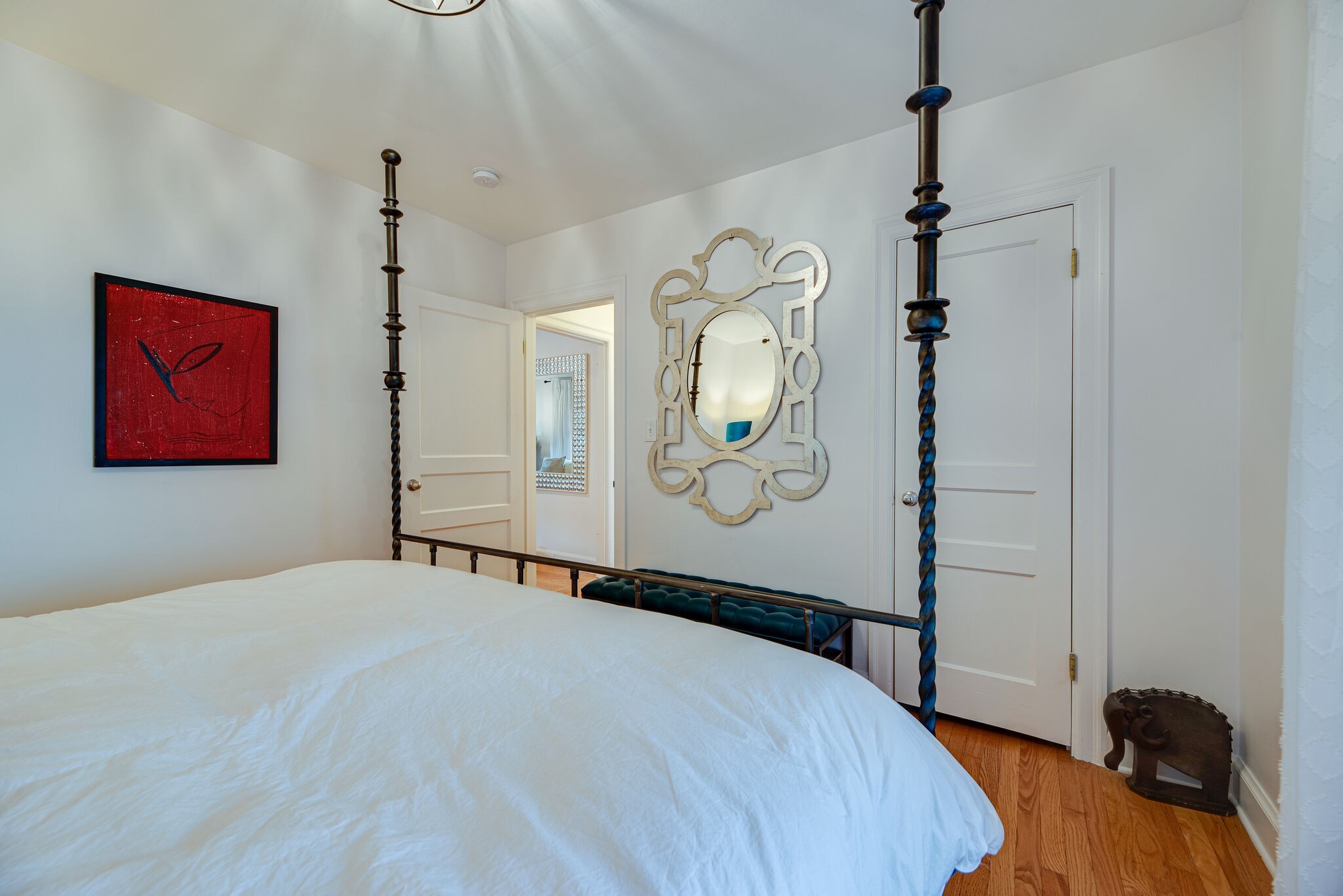 1715 Holly Street Nashville, TN 37206 - Photo 21 of 54 a bedroom with a bed and a mirror