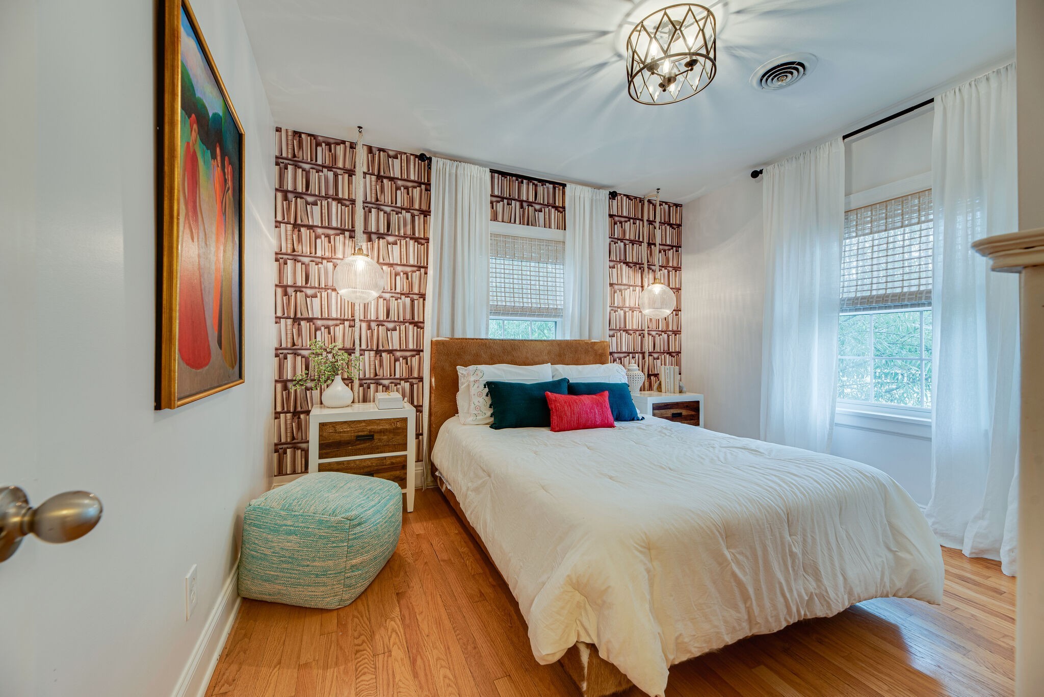 1715 Holly Street Nashville, TN 37206 - Photo 24 of 54 a bedroom with a bed and a chandelier