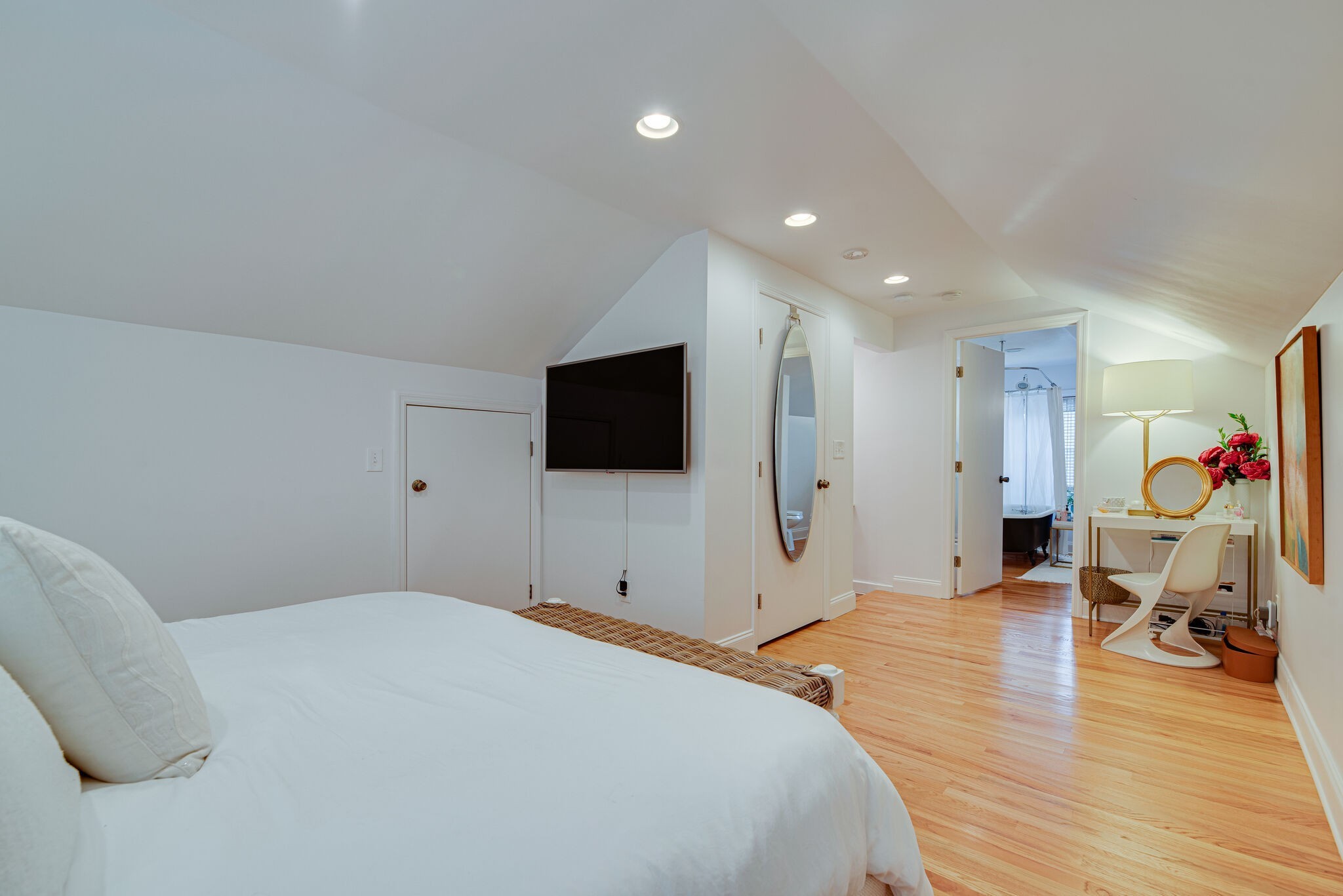 1715 Holly Street Nashville, TN 37206 - Photo 27 of 54 a bedroom with a bed and a flat screen tv