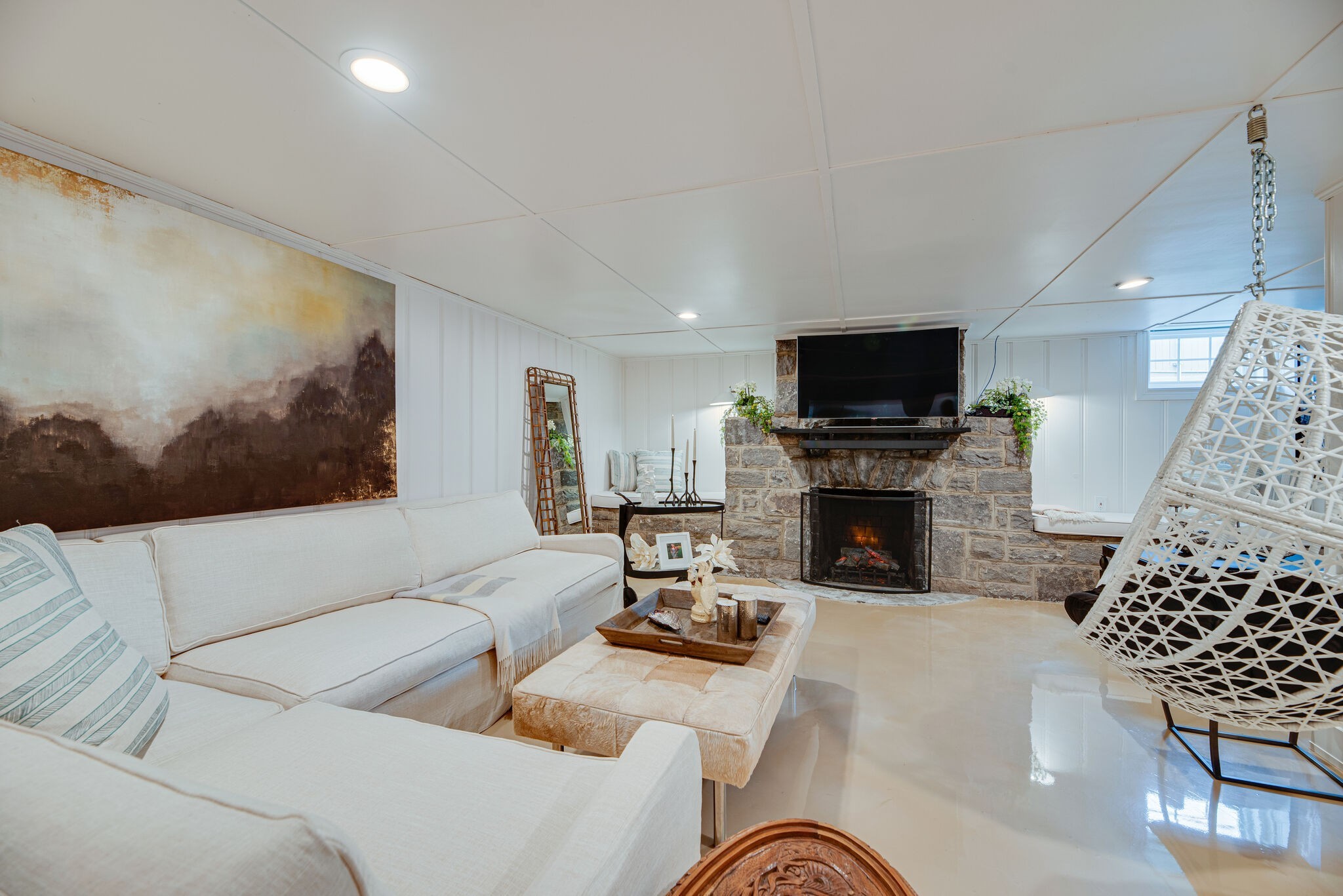 1715 Holly Street Nashville, TN 37206 - Photo 32 of 54 a living room with furniture a fireplace and a flat screen tv