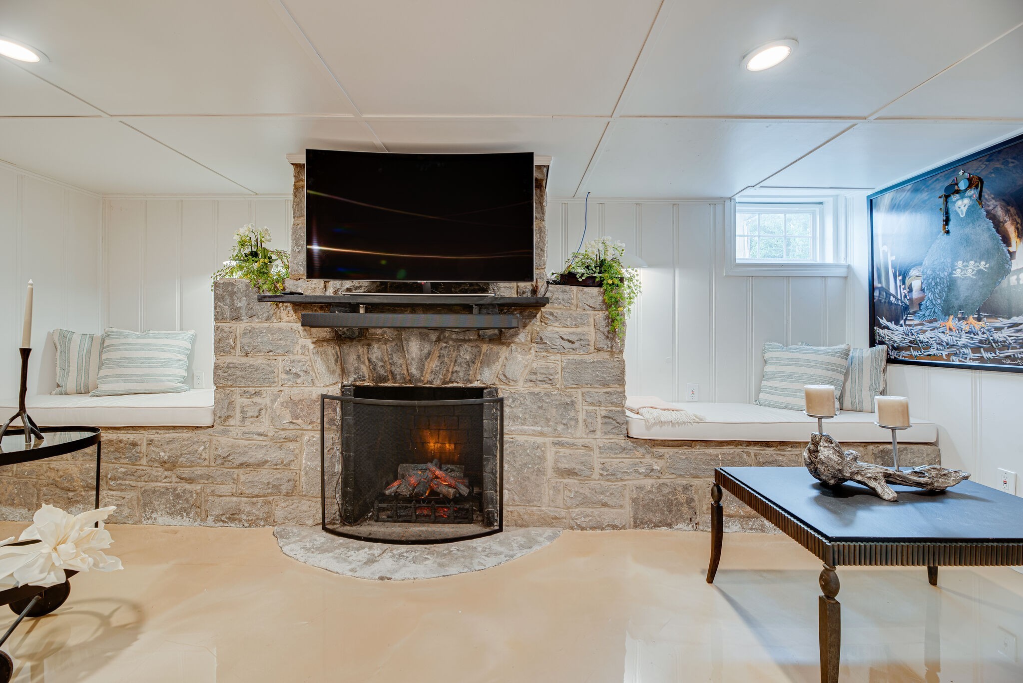 1715 Holly Street Nashville, TN 37206 - Photo 34 of 54 a living room with furniture a flat screen tv and a fireplace
