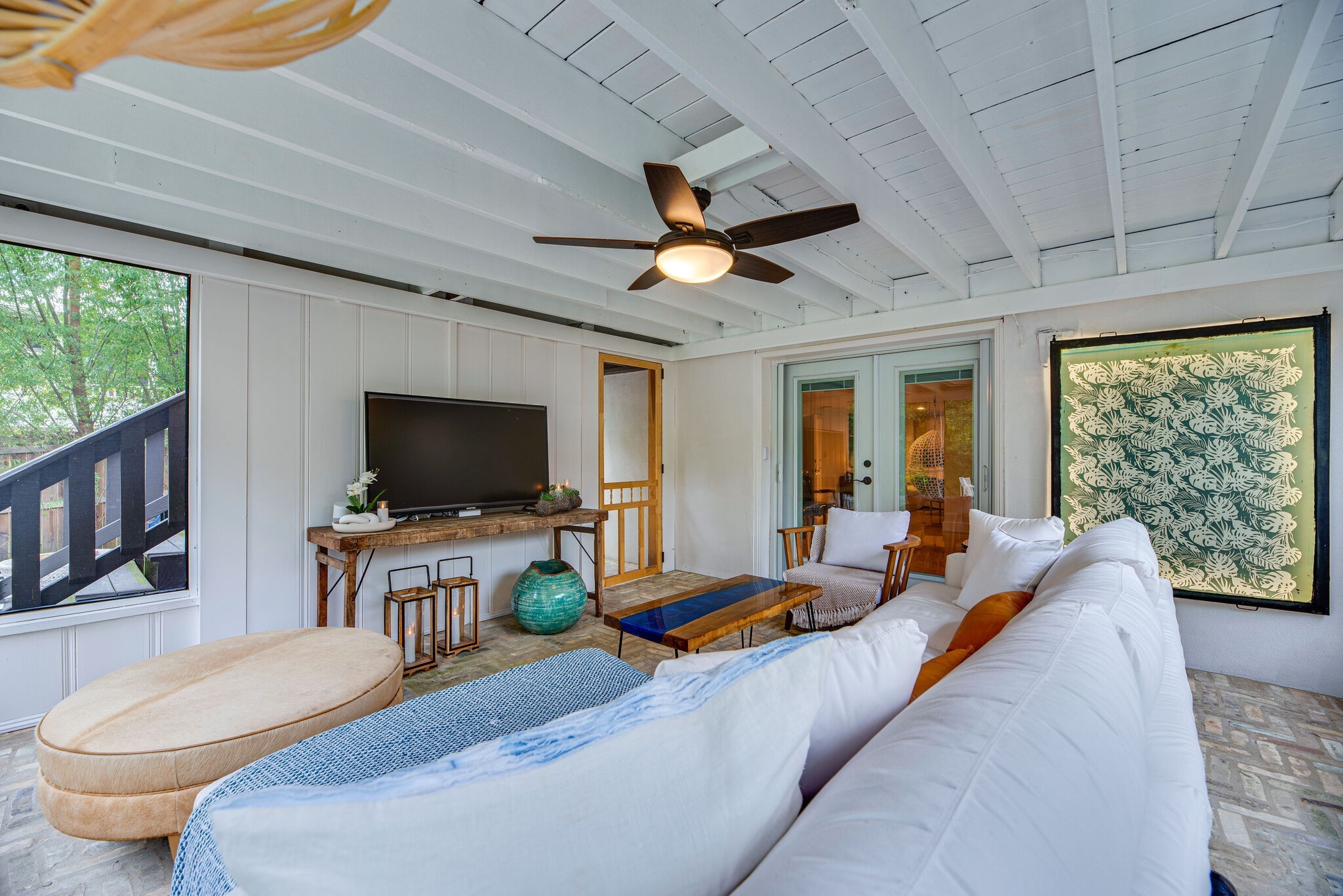 1715 Holly Street Nashville, TN 37206 - Photo 40 of 54 a living room with furniture a flat screen tv and a large window